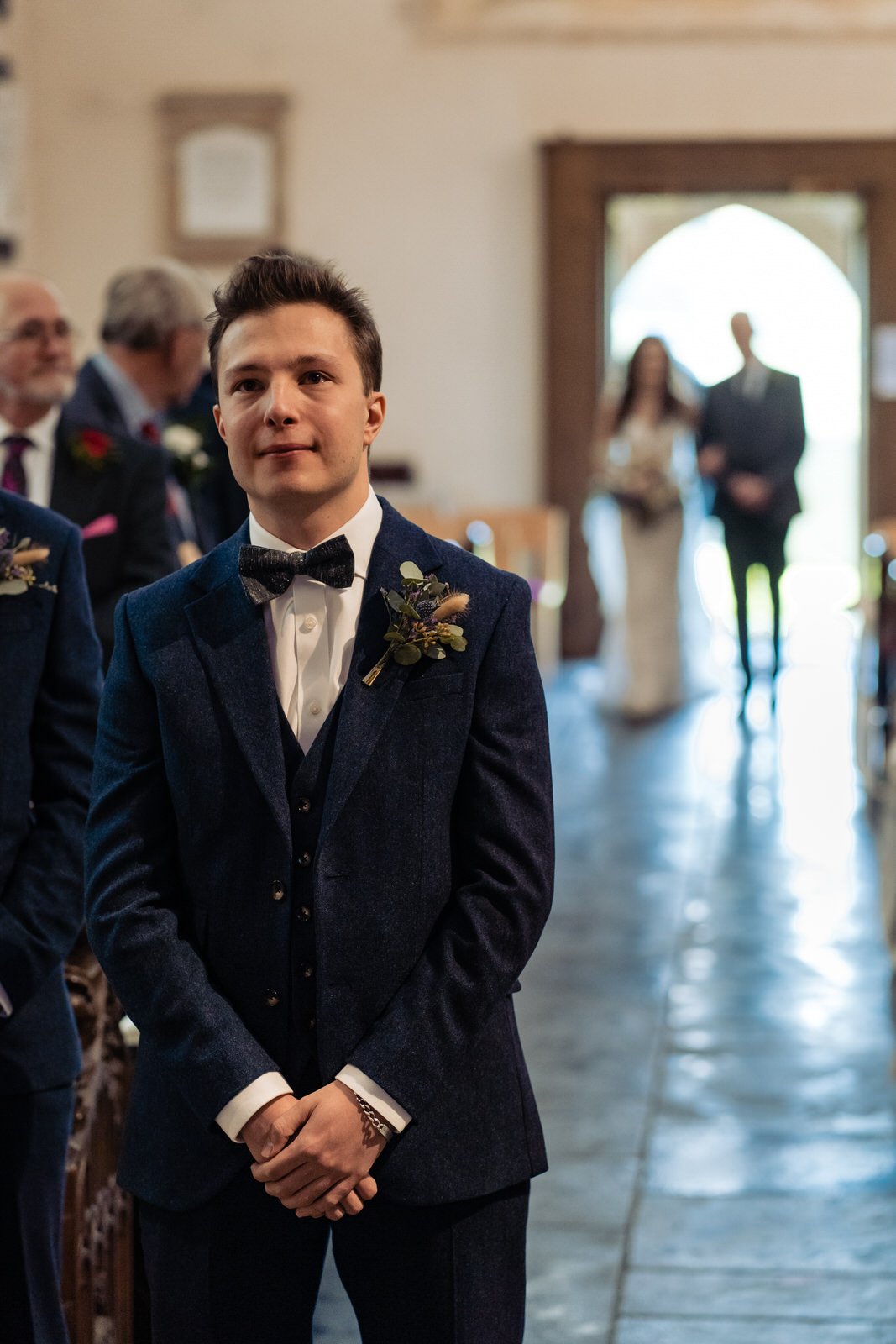 groom waiting for bride