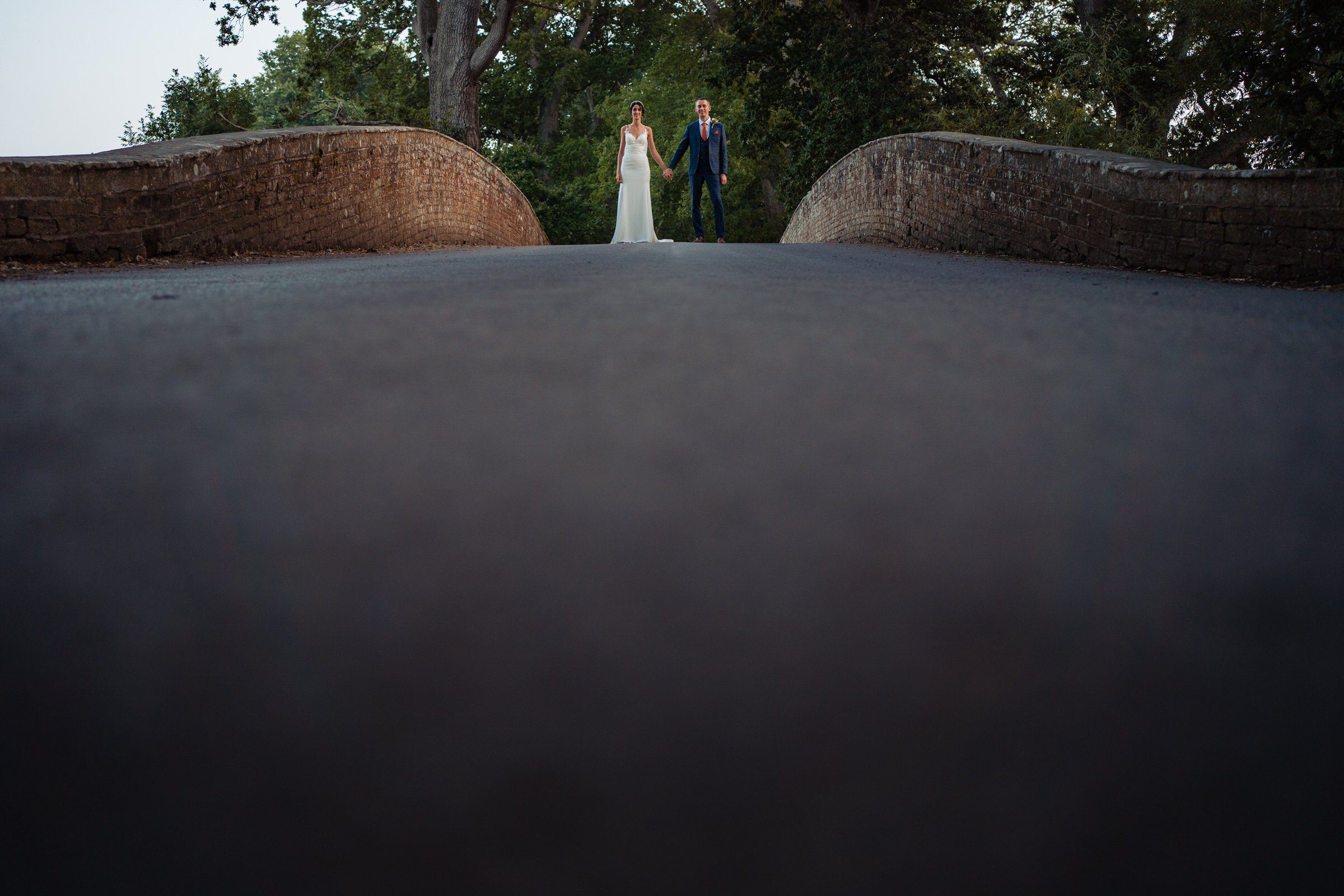 bride - groom - powderham castle - bridge - devon.jpg