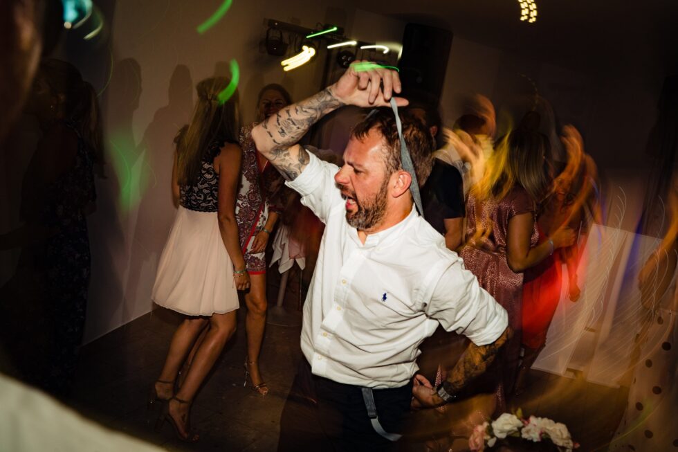 Funny best man dancing at a Majorca wedding. Yeti Wedding Photography captures the fun on the dance floor.