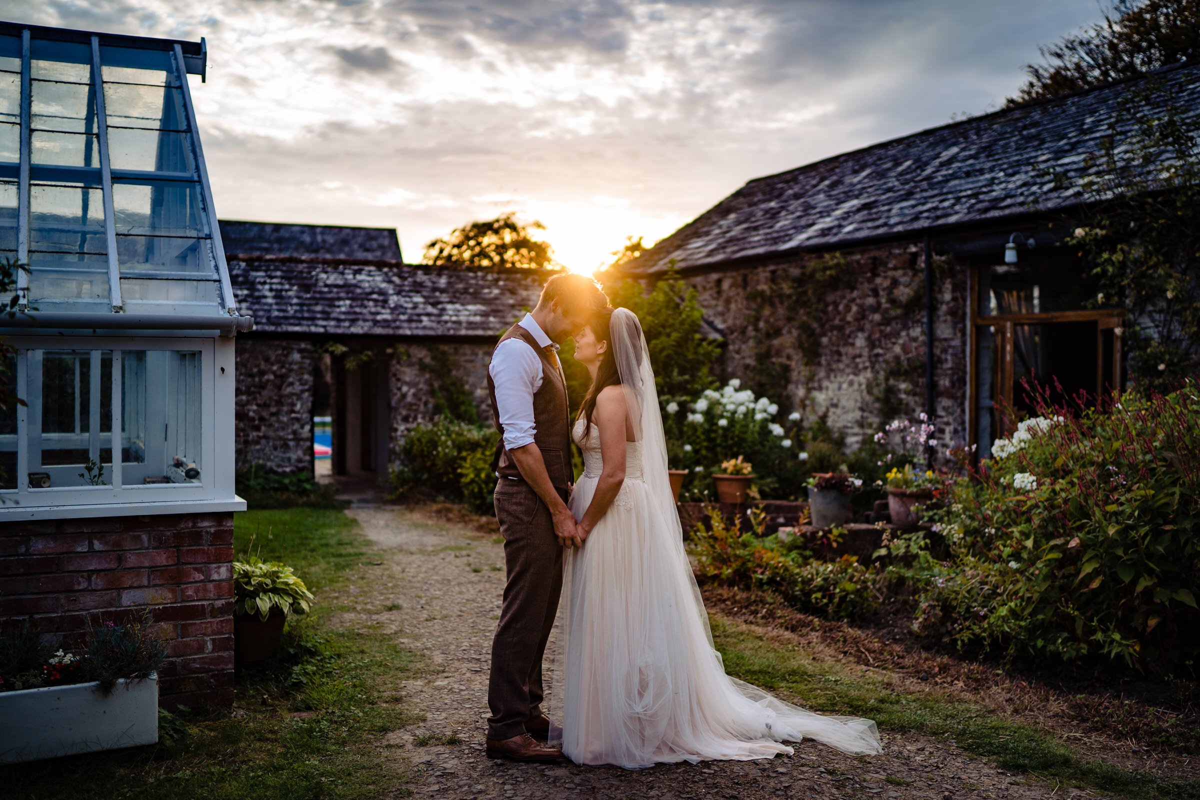 sunset - wedding - bride and groom - westcott barton - devon.jpg