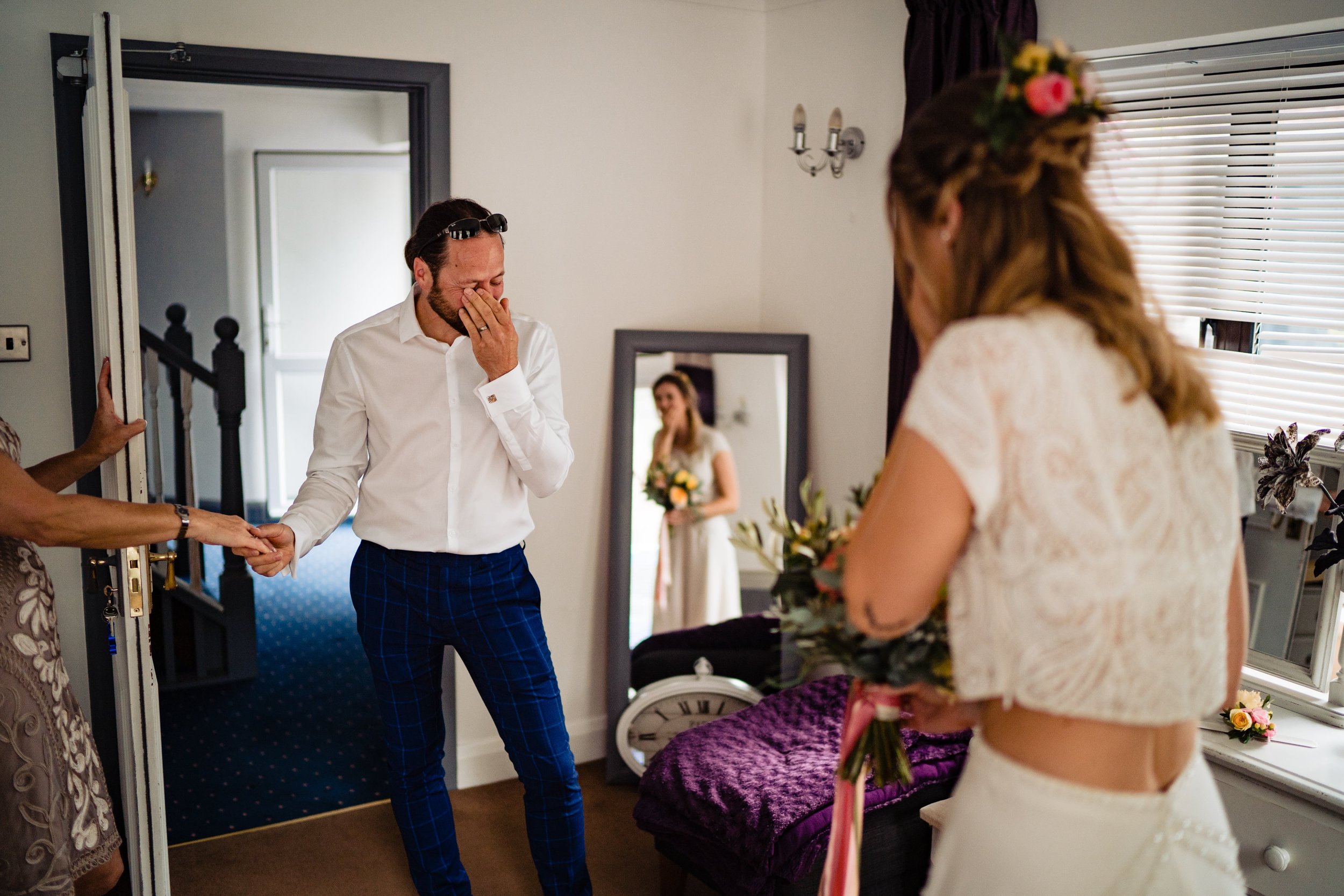 wedding dad first look with bride